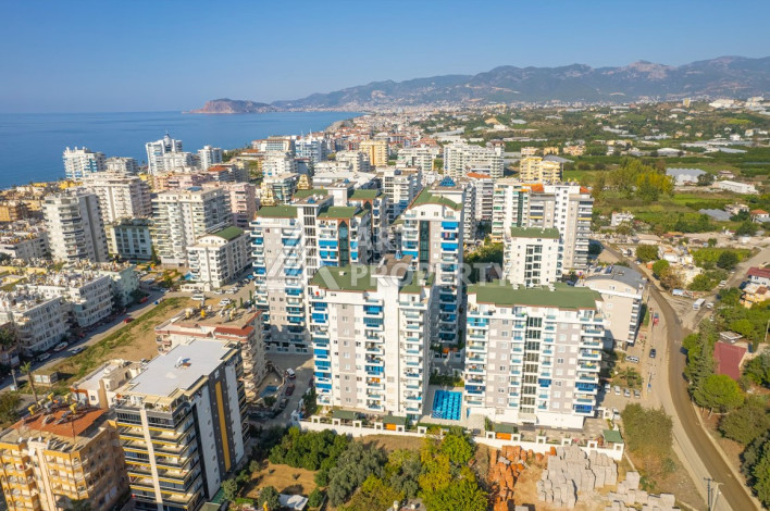 Стильная квартира в жилом комплексе с развитой инфраструктурой в районе Махмутлар, планировки 2+1, 115м2 - Ракурс 25