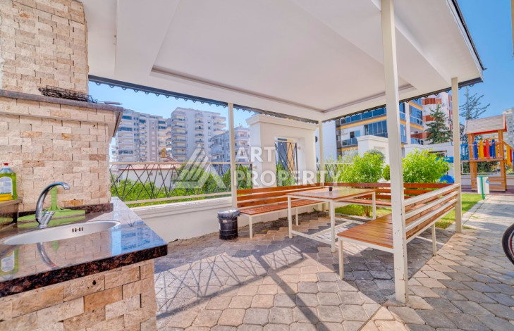 Стильная квартира в жилом комплексе с развитой инфраструктурой в районе Махмутлар, планировки 2+1, 115м2 - Ракурс 30