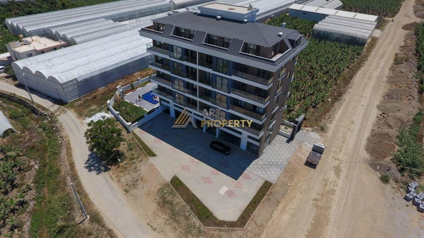 Квартиры планировок 1+1 и 2+1 в новом комплексе в районе Каргыджак, 60-110 м2 - Ракурс 21