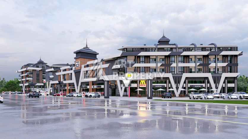 Новый коммерческий центр на шоссе Новая Анталия - Мерсин с высокими стандартами строительства. - Ракурс 8