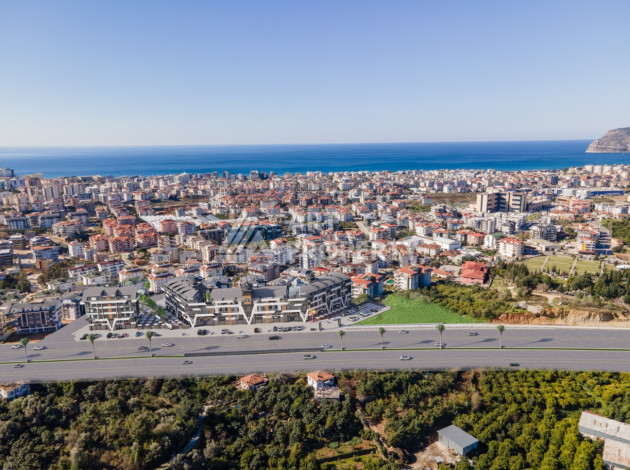 Новый коммерческий центр на шоссе Новая Анталия - Мерсин с высокими стандартами строительства. - Ракурс 14