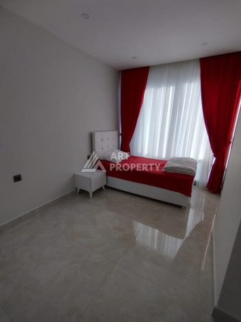 Апартаменты на первой береговой линии планировки 2+1 в районе Махмутлар, 90м2 - Ракурс 4