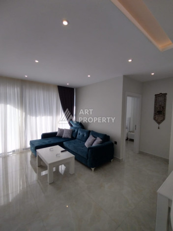 Апартаменты на первой береговой линии планировки 2+1 в районе Махмутлар, 90м2 - Ракурс 6