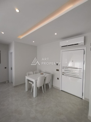 Апартаменты на первой береговой линии планировки 2+1 в районе Махмутлар, 90м2 - Ракурс 7