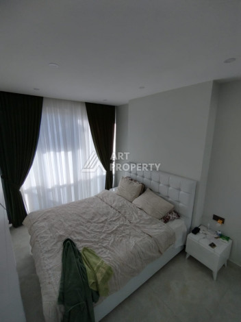 Апартаменты на первой береговой линии планировки 2+1 в районе Махмутлар, 90м2 - Ракурс 10