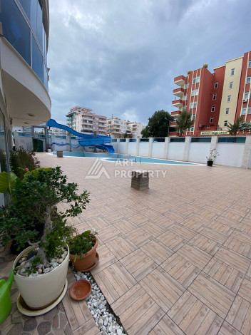 Апартаменты в шикарном комплексе планировки 2+1 в районе Махмутлар, 115м2 - Ракурс 24