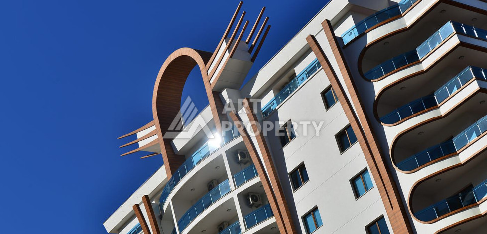 Апартаменты в одном из лучших жилых комплексов в районе Махмутлар, планировка 2+1 - Ракурс 35