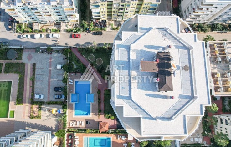 Стильные меблированные апартаменты планировки 2+1 в районе Махмутлар, 100м2 - Ракурс 3