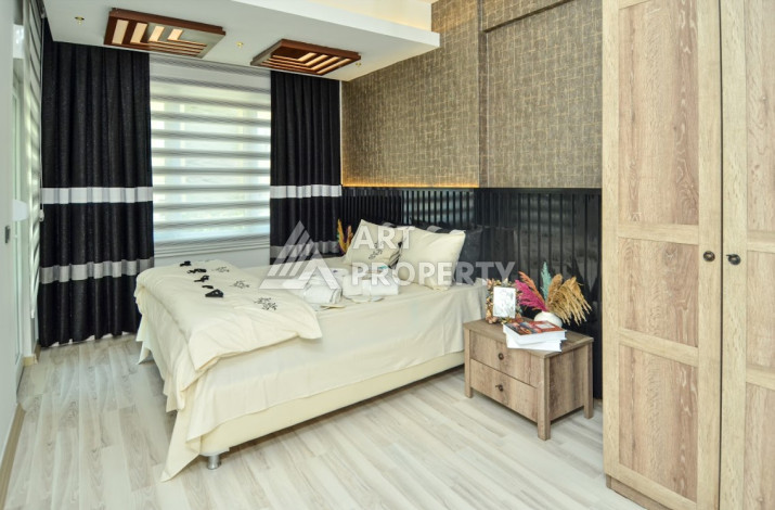 Стильные меблированные апартаменты планировки 2+1 в районе Махмутлар, 100м2 - Ракурс 11