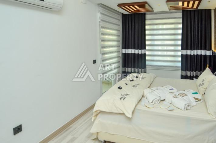 Стильные меблированные апартаменты планировки 2+1 в районе Махмутлар, 100м2 - Ракурс 12