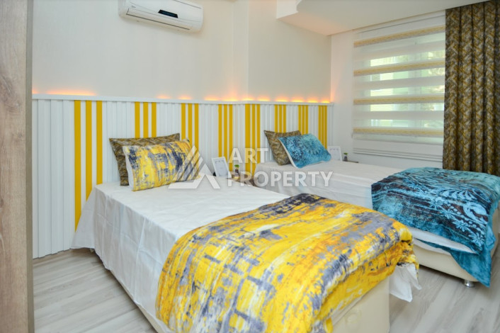 Стильные меблированные апартаменты планировки 2+1 в районе Махмутлар, 100м2 - Ракурс 15