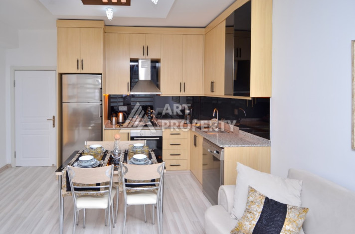 Стильные меблированные апартаменты планировки 2+1 в районе Махмутлар, 100м2 - Ракурс 21