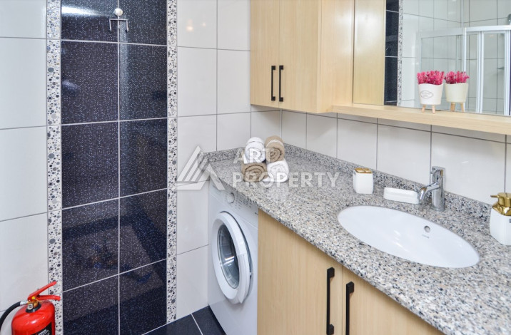 Стильные меблированные апартаменты планировки 2+1 в районе Махмутлар, 100м2 - Ракурс 26