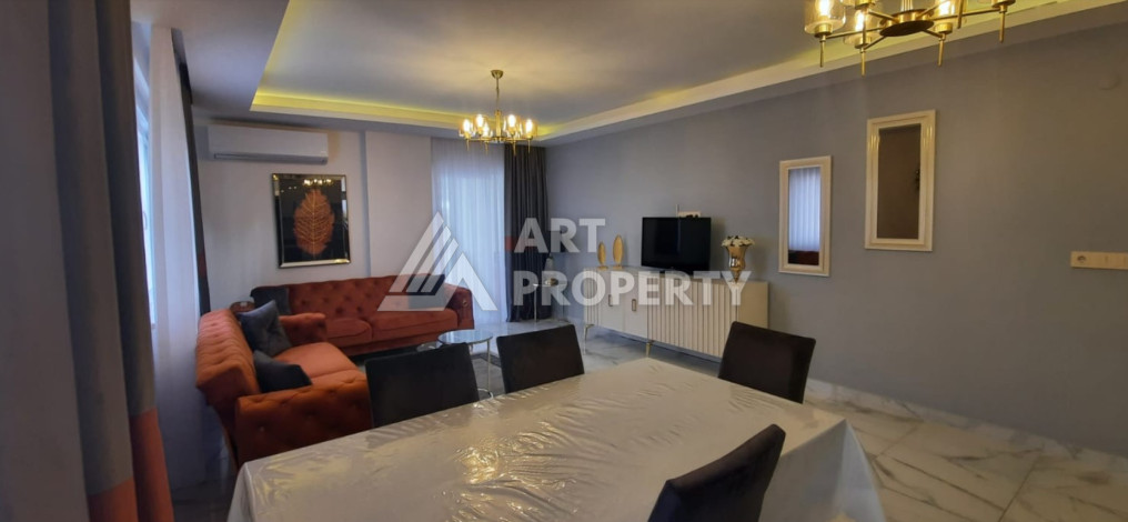 Апартаменты в 150-ти метрах от моря планировки 2+1 в районе Махмутлар, 115м2 - Ракурс 2