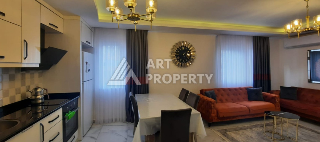 Апартаменты в 150-ти метрах от моря планировки 2+1 в районе Махмутлар, 115м2 - Ракурс 5