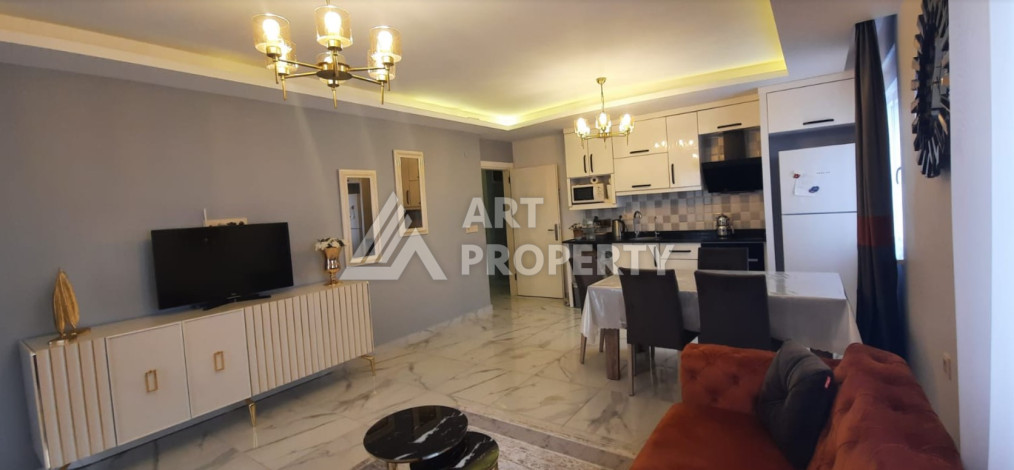 Апартаменты в 150-ти метрах от моря планировки 2+1 в районе Махмутлар, 115м2 - Ракурс 6