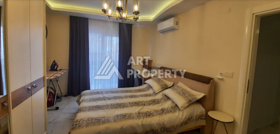 Апартаменты в 150-ти метрах от моря планировки 2+1 в районе Махмутлар, 115м2 - Ракурс 10