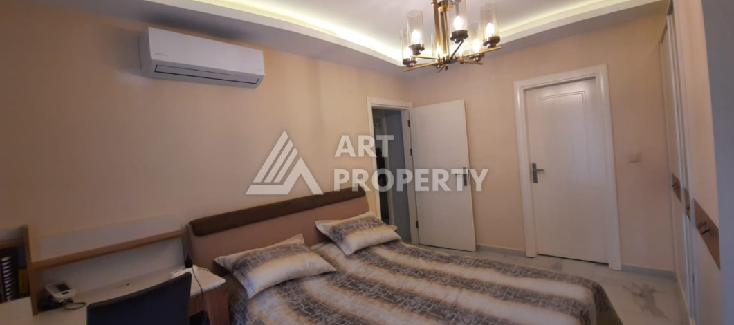 Апартаменты в 150-ти метрах от моря планировки 2+1 в районе Махмутлар, 115м2 - Ракурс 11