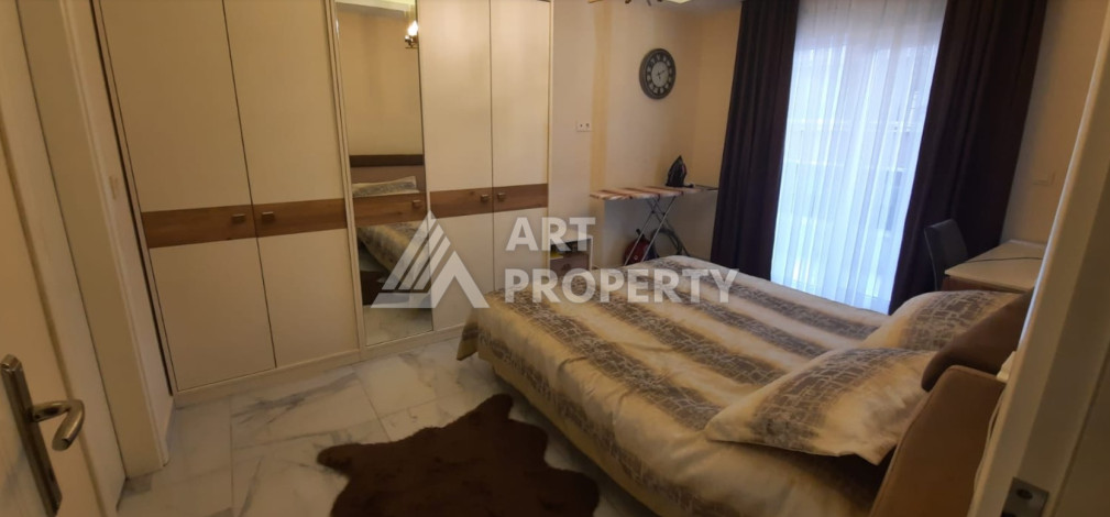 Апартаменты в 150-ти метрах от моря планировки 2+1 в районе Махмутлар, 115м2 - Ракурс 12