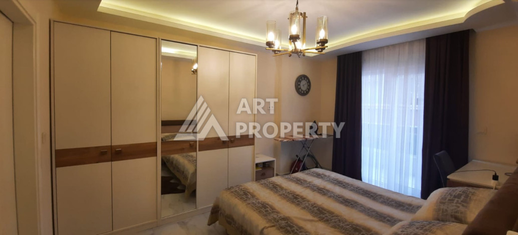 Апартаменты в 150-ти метрах от моря планировки 2+1 в районе Махмутлар, 115м2 - Ракурс 14