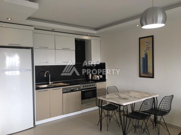 Квартира в жилом комплексе с инфраструктурой, 1+1, 65м2, в районе Махмутлар - Ракурс 2