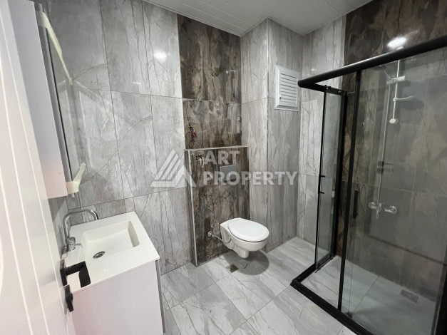 Апартаменты в новом жилом комплексе в живописном районе Авсаллар планировки 1+1, 58м2 - Ракурс 3