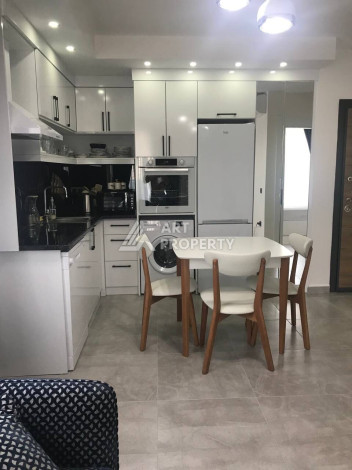 Квартира 1+1, 50м2, в современном жилом комплексе с трансфером до моря, в районе верхняя Оба - Ракурс 2