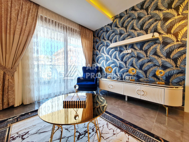 Меблированная квартира планировки 1+1, 65м2, в 150 метрах от моря, в районе Махмутлар - Ракурс 2