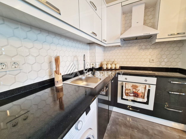 Меблированная квартира планировки 1+1, 65м2, в 150 метрах от моря, в районе Махмутлар - Ракурс 4