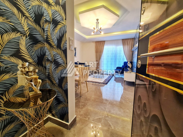 Меблированная квартира планировки 1+1, 65м2, в 150 метрах от моря, в районе Махмутлар - Ракурс 5