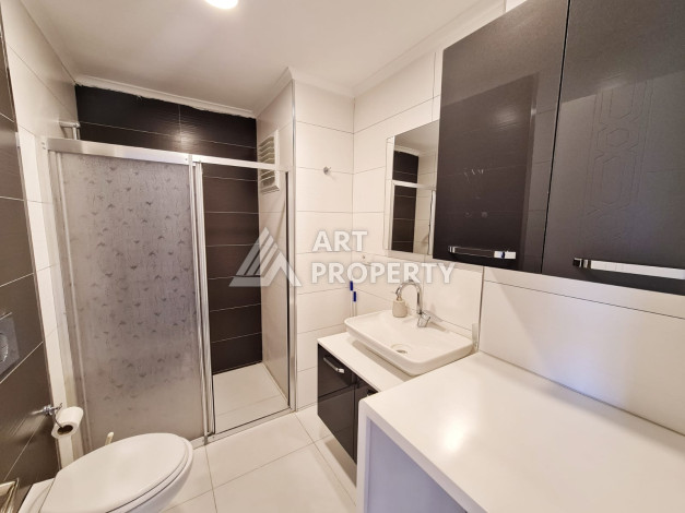 Меблированная квартира планировки 1+1, 65м2, в 150 метрах от моря, в районе Махмутлар - Ракурс 6