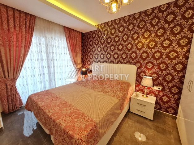 Меблированная квартира планировки 1+1, 65м2, в 150 метрах от моря, в районе Махмутлар - Ракурс 7