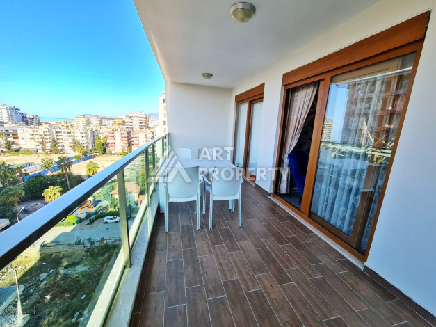 Меблированная квартира планировки 1+1, 65м2, в 150 метрах от моря, в районе Махмутлар - Ракурс 8