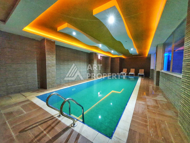 Меблированная квартира планировки 1+1, 65м2, в 150 метрах от моря, в районе Махмутлар - Ракурс 9