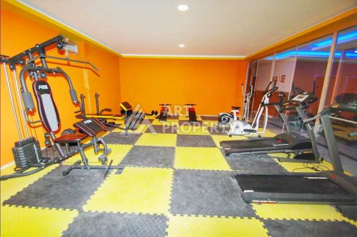 Меблированная квартира планировки 1+1, 65м2, в 150 метрах от моря, в районе Махмутлар - Ракурс 11