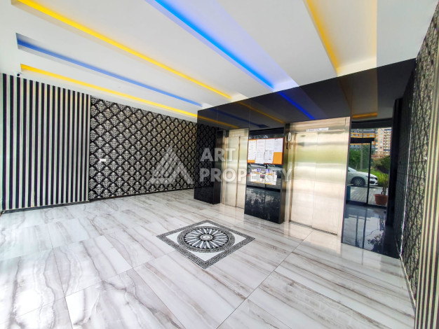 Меблированная квартира планировки 1+1, 65м2, в 150 метрах от моря, в районе Махмутлар - Ракурс 13