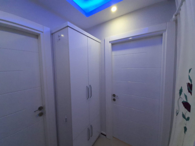 Квартира планировки 1+1 с прекрасным видом на старинный город Наулу в районе Махмутлар Алания, 65 м2. - Ракурс 4