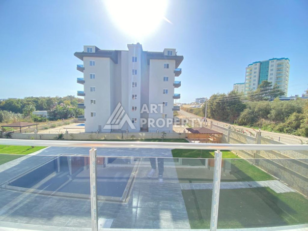 Апартаменты в жилом комплексе с просторной территорией в районе Авсаллар планировки 1+1,55м2 - Ракурс 3