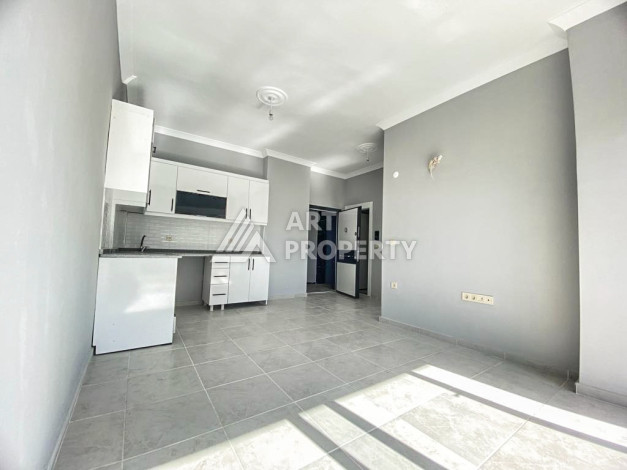 Апартаменты в жилом комплексе с просторной территорией в районе Авсаллар планировки 1+1,55м2 - Ракурс 5