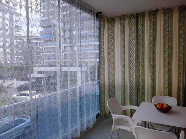 Квартира планировки 1+1 с прекрасным видом на старинный город Наулу в районе Махмутлар Алания, 65 м2. - Ракурс 13