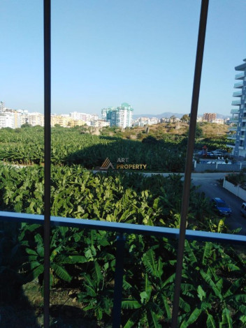 Квартира планировки 1+1 с прекрасным видом на старинный город Наулу в районе Махмутлар Алания, 65 м2. - Ракурс 15