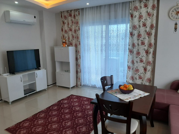 Квартира планировки 1+1 с прекрасным видом на старинный город Наулу в районе Махмутлар Алания, 65 м2. - Ракурс 17