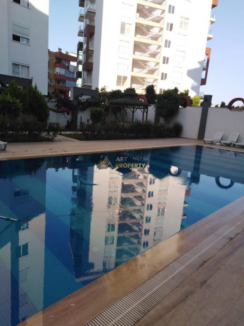 Квартира планировки 1+1 с прекрасным видом на старинный город Наулу в районе Махмутлар Алания, 65 м2. - Ракурс 21