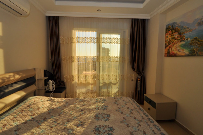 Квартира 1+1 с видом на море в Махмутларе, 65 м2 - Ракурс 11