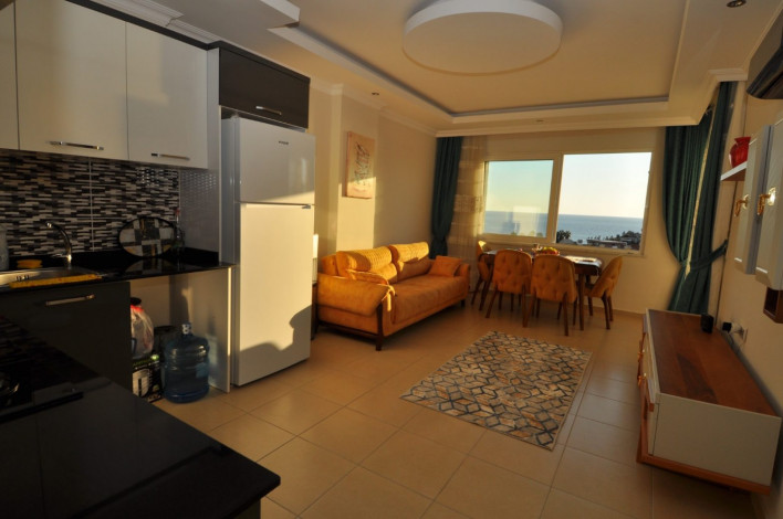 Квартира 1+1 с видом на море в Махмутларе, 65 м2 - Ракурс 24