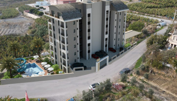 Новый жилой комплекс в Махмутлар со своим собственным пляжем, 60-110 м2 - Ракурс 9