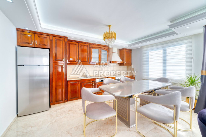 Квартира 2+1 с ремонтом в добротном комплексе на первой линии в Махмутларе! - Ракурс 10