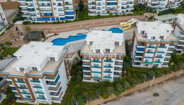 Апартаменты в комплексе с богатой инфраструктурой планировки 2+1 в районе Каргыджак, 100м2 - Ракурс 1