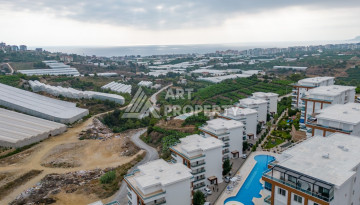 Апартаменты в комплексе с богатой инфраструктурой планировки 2+1 в районе Каргыджак, 100м2 - Ракурс 23