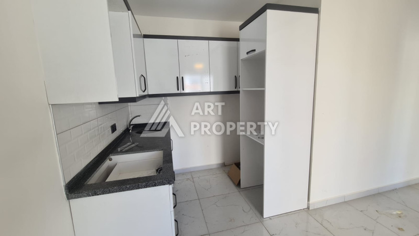 Квартира планировки 1+1 в комплексе с развитой инфраструктурой в районе Махмутлар, 55м2 - Ракурс 9